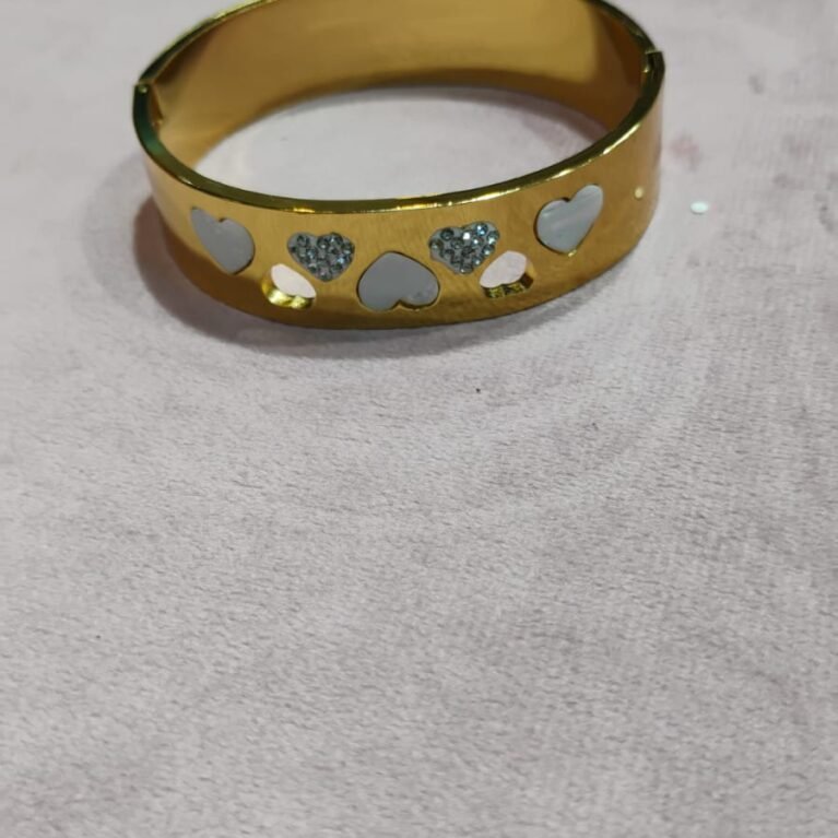 Title: Elegant Geometric Gold-Toned Cut-Out Bangle with Crystal Accents