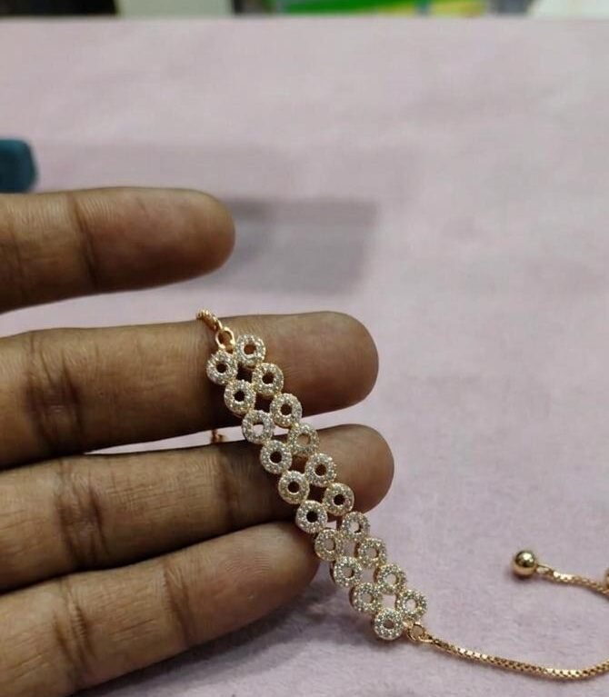 Elegant CZ Floral Design Adjustable Bracelet – Gold Finish