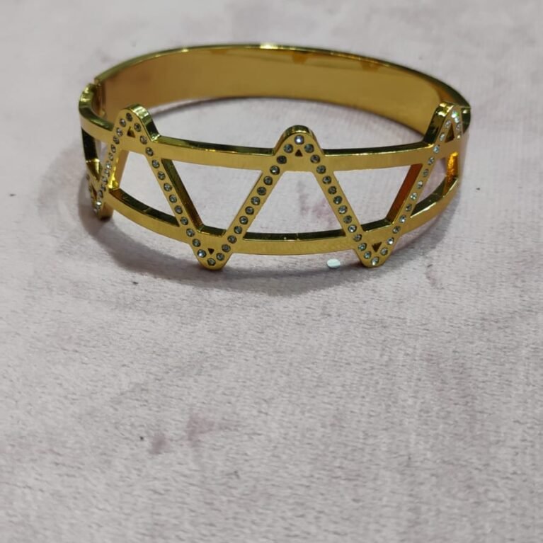 Elegant Geometric Gold-Toned Cut-Out Bangle with Crystal Accents