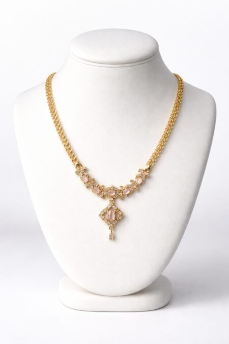 Vintage-Style Gilded Necklace with Pink Stone Accents