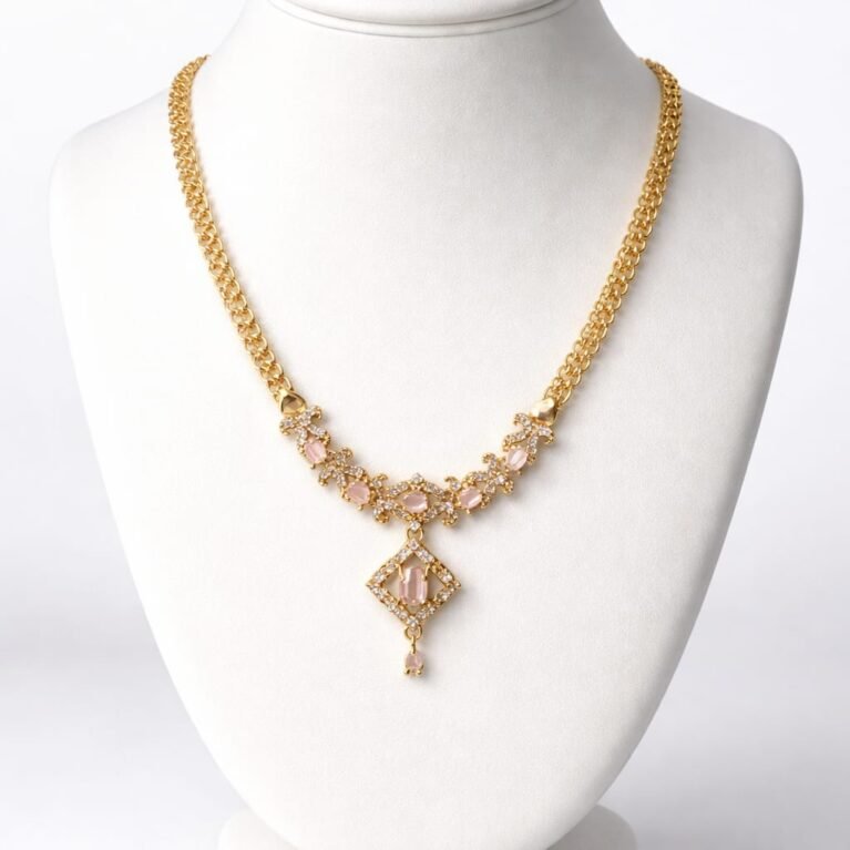 Vintage-Style Gilded Necklace with Pink Stone Accents
